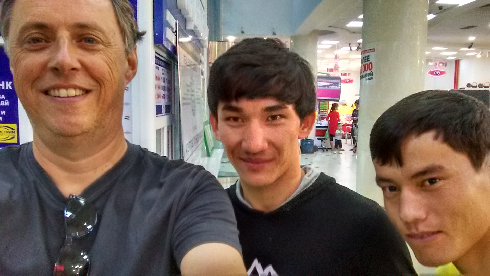 Me with an Uzbek and a Turkmen. We bumped into each other in a supermarket.